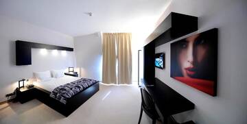 Фото номера Двухместный номер Делюкс с 1 кроватью Отель Plaza V Executive Hotel г. Тыргу-Муреш 4