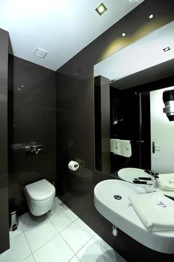 Фото номера Двухместный номер Делюкс с 1 кроватью Отель Plaza V Executive Hotel г. Тыргу-Муреш 7