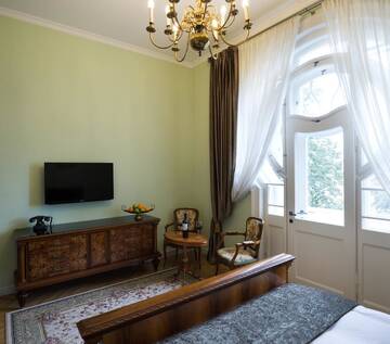 Фото номера Классический люкс Гостевой дом Villa Csonka by Privo г. Тыргу-Муреш 4