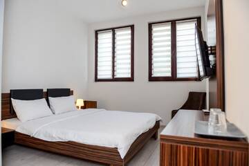 Фото номера Двухместный номер с 1 кроватью Гостевой дом Luxe Stay г. Тыргу-Муреш 2