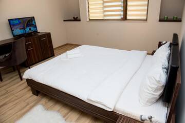 Фото номера Улучшенный двухместный номер с 1 кроватью Гостевой дом Luxe Stay г. Тыргу-Муреш 5