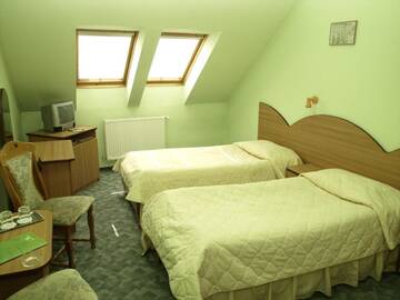 Фото номера Двухместный номер с 2 отдельными кроватями Отель Hotel Everest г. Тыргу-Муреш 8
