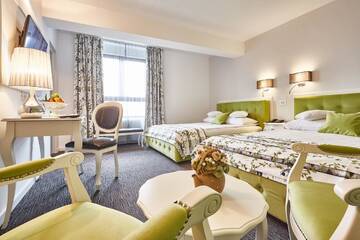 Фото номера Family Room Deluxe Отель Continental Forum Tirgu Mures г. Тыргу-Муреш 6